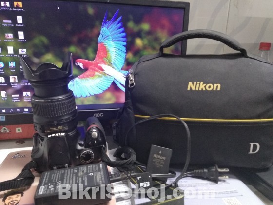Nikon D3200 with lens (18-55)